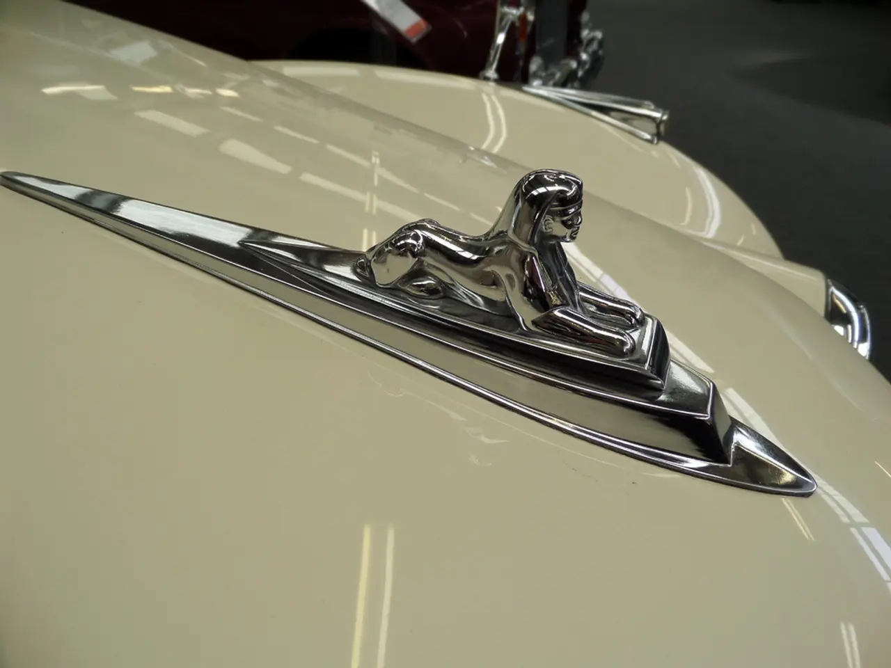 In this image there are car logos on the car.