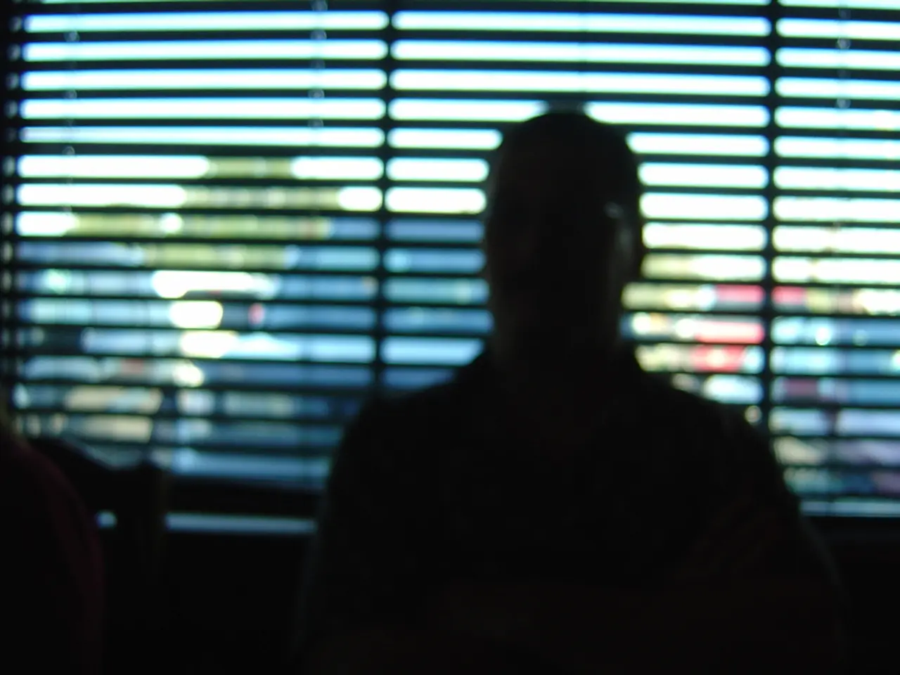 In this image I can see few vehicles and I can see this image is little bit blurry.