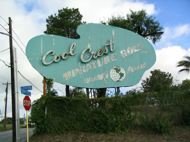 In this image we can see a blue color board on which we can see some text, we can stop board,...