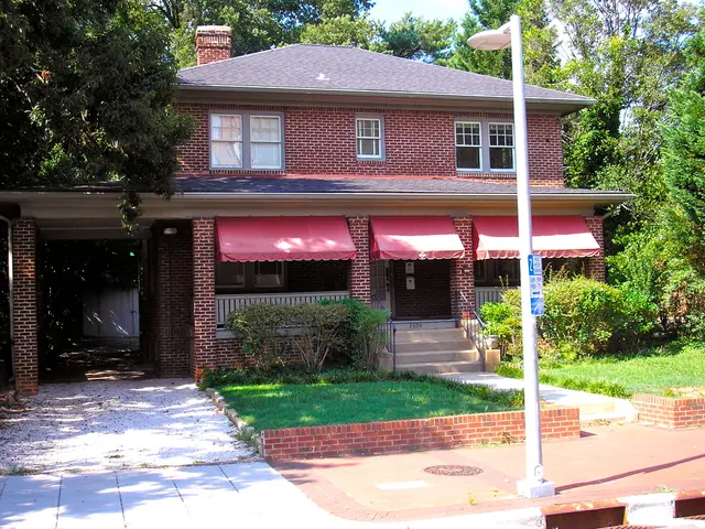 In the image there is a house with brick walls, windows, doors, stairs, railings, roofs and...