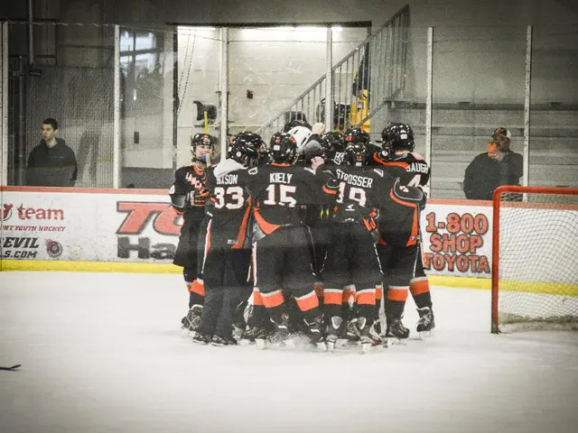 Here in this picture we can see a group of people standing on the ice floor, as we can see all of...