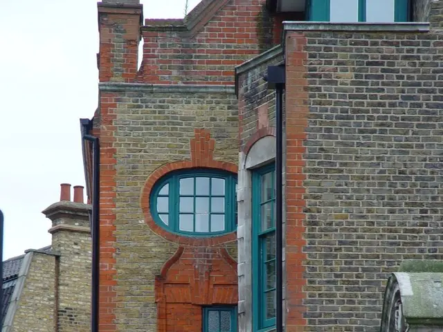 In this picture there are buildings in the image and there are windows on the buildings, there is a...